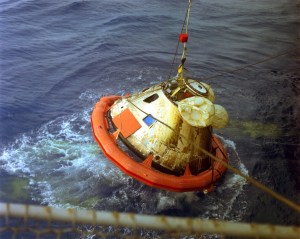 Apollo 8 Command Module being recovered after splashdown.